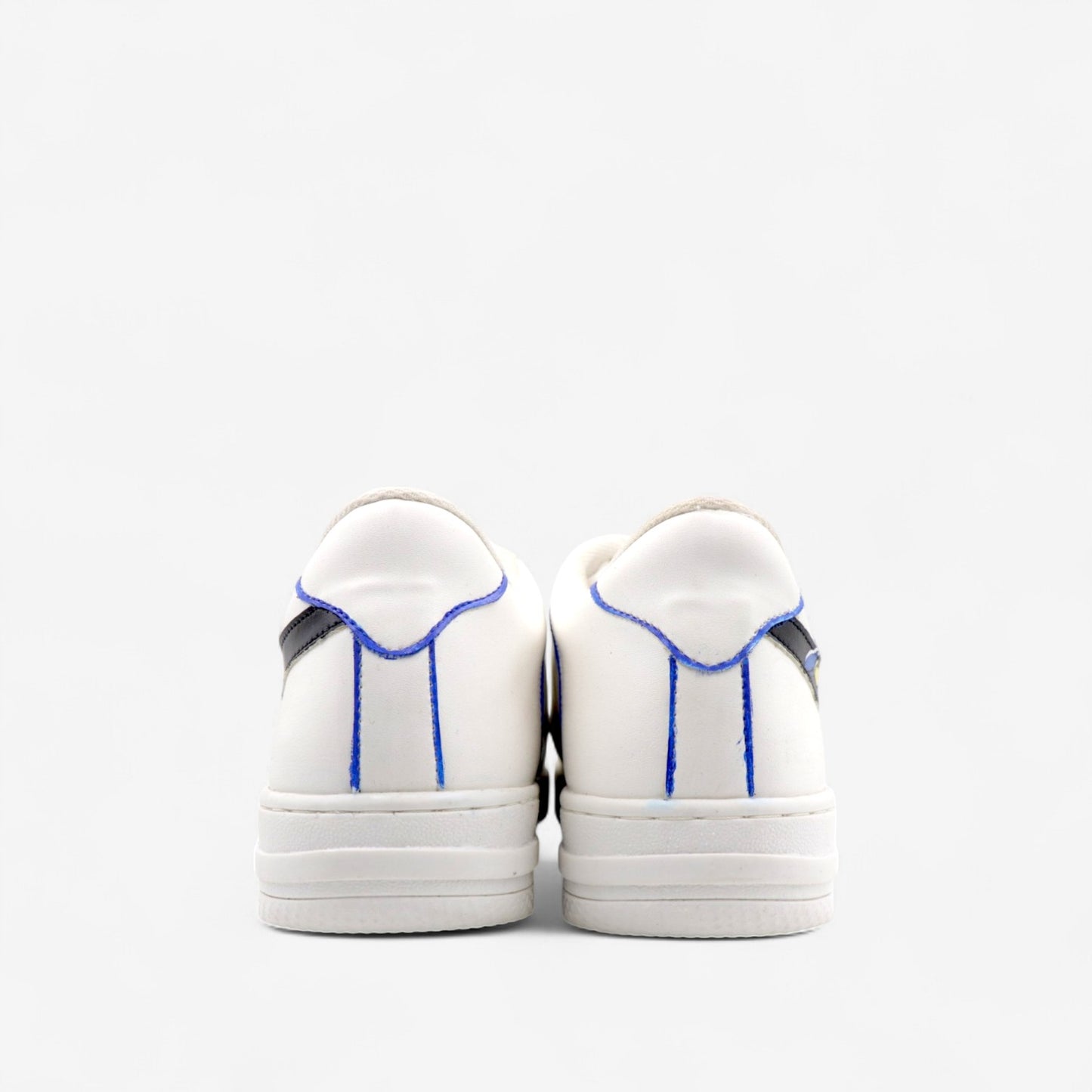 Bart Simpson spray-painting a swoosh